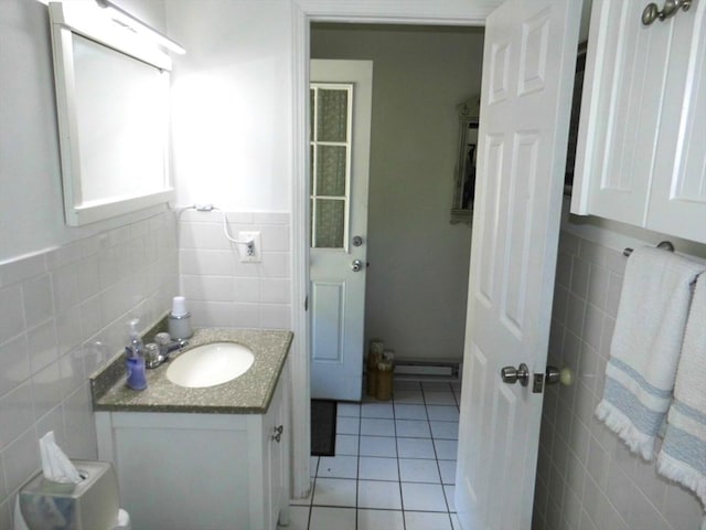 55A Millville Cir, Salem, NH 03079 - bathroom featuring tile walls, vanity, tile patterned flooring, and a baseboard radiator