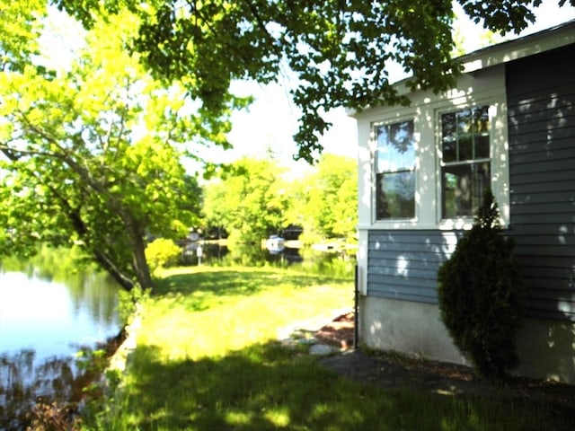 55A Millville Cir, Salem, NH 03079 - view of green lawn with a water view