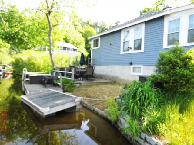 55A Millville Cir, Salem, NH 03079 - back of property featuring a patio