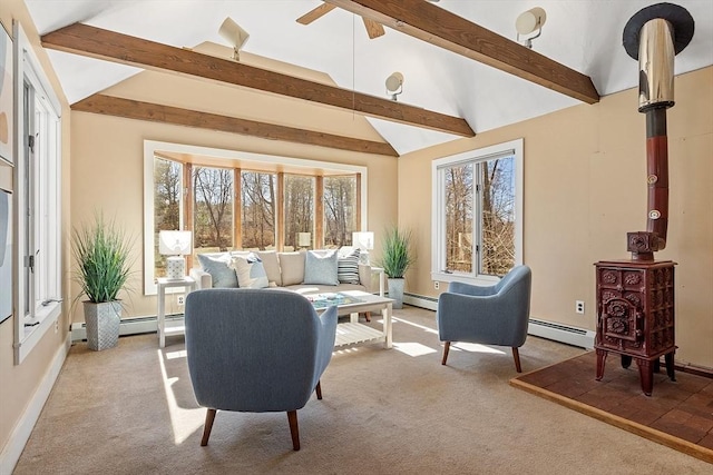 living area with lofted ceiling with beams, baseboards, carpet floors, and baseboard heating