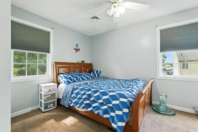 82 Lloyd Ave, Springfield, MA 01119 - bedroom with multiple windows, carpet floors, and ceiling fan