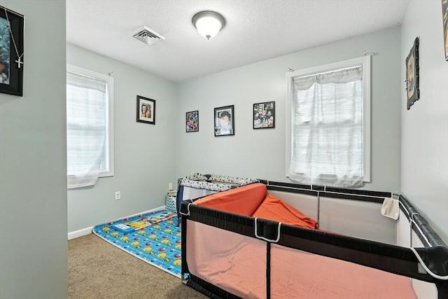 82 Lloyd Ave, Springfield, MA 01119 - bedroom with carpet floors and baseboards