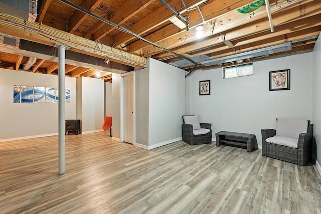 82 Lloyd Ave, Springfield, MA 01119 - basement with wood finished floors and baseboards