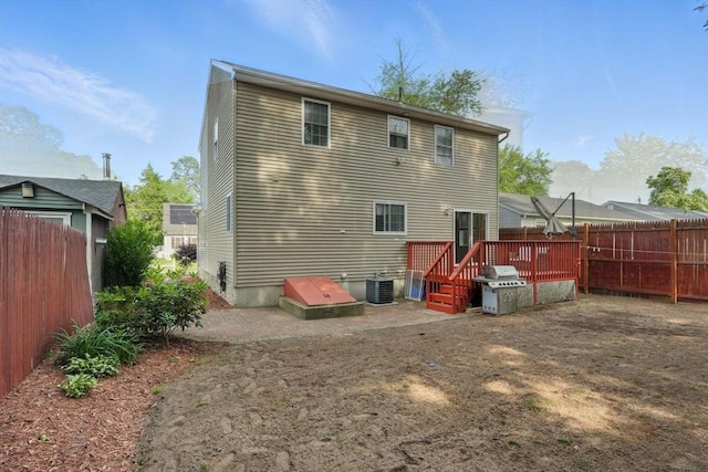 82 Lloyd Ave, Springfield, MA 01119 - back of house with a wooden deck and a fenced backyard