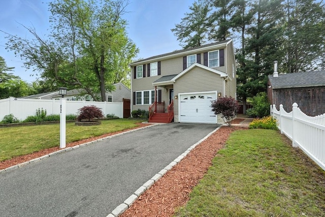 82 Lloyd Ave, Springfield, MA 01119 - view of front of home featuring driveway and a garage