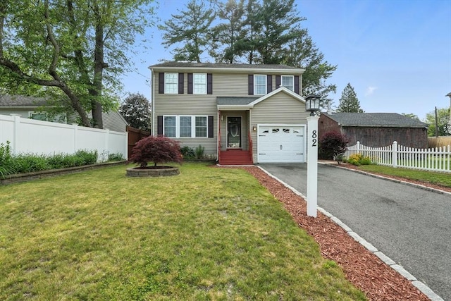 82 Lloyd Ave, Springfield, MA 01119 - traditional-style house featuring driveway and an attached garage