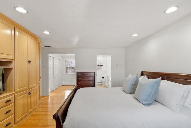 bedroom featuring visible vents, a baseboard radiator, light wood-style floors, a baseboard heating unit, and recessed lighting