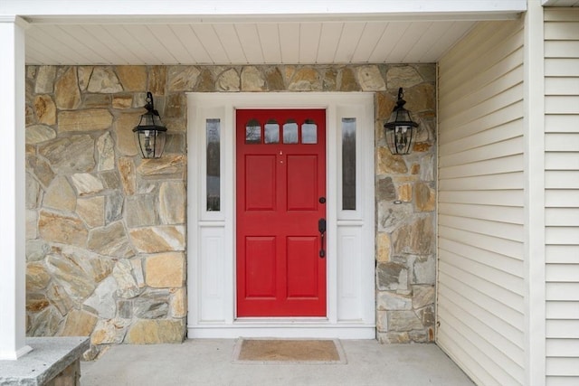 view of exterior entry with stone siding