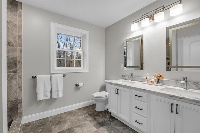 62 Bolton Rd Applewood, Unit Applewood, Westminster, MA 01473 - full bath featuring baseboards, double vanity, toilet, and marble look tile flooring