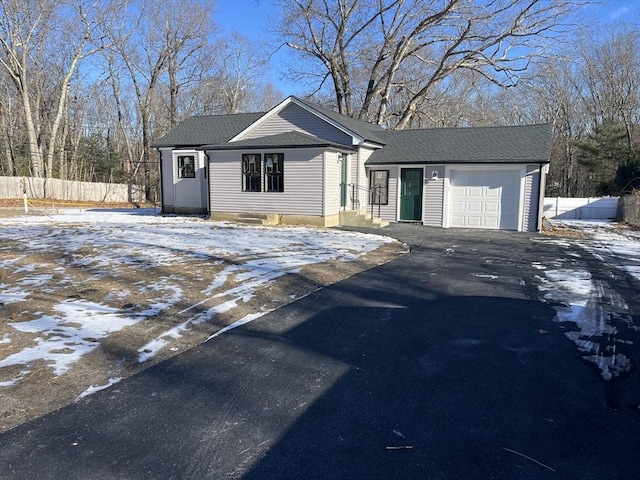 ranch-style house with a garage