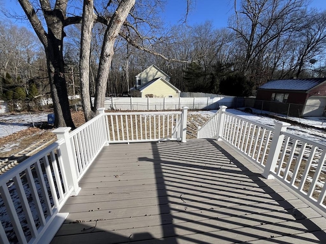 view of snow covered deck