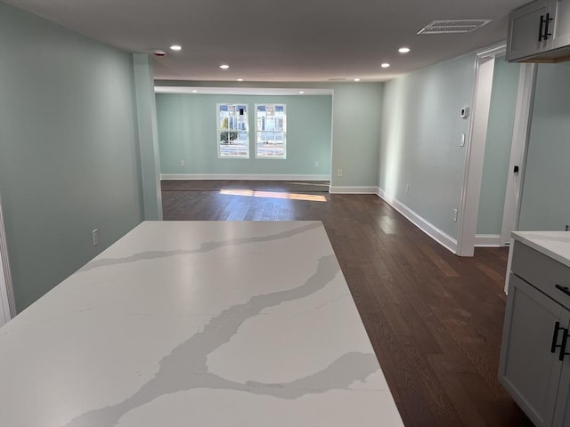 interior space with dark hardwood / wood-style floors