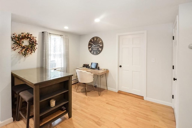 office area with recessed lighting, baseboards, and light wood finished floors