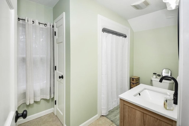 bathroom featuring visible vents, a shower with shower curtain, tile patterned flooring, and vanity