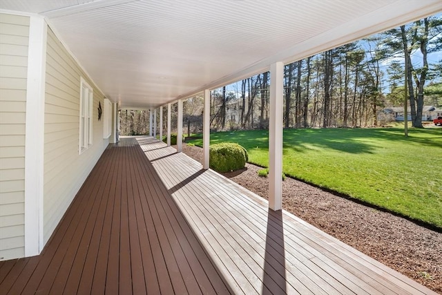 deck featuring a lawn