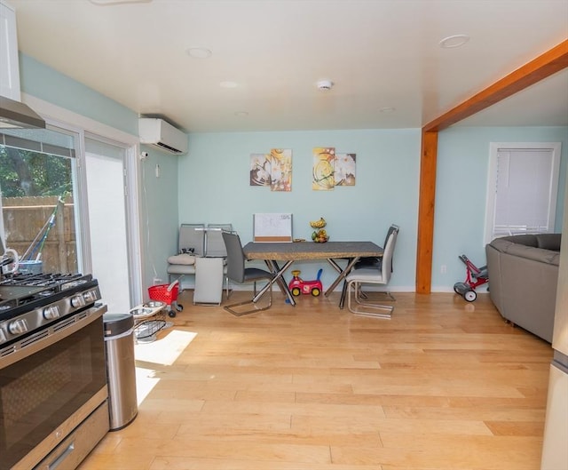 33 Williams St, New London, CT 06320 - dining room with an AC wall unit and wood finished floors