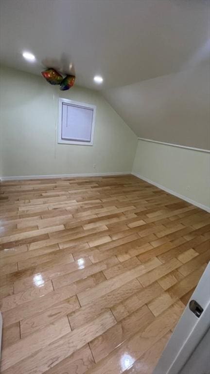 33 Williams St, New London, CT 06320 - additional living space featuring light wood-style flooring, vaulted ceiling, and recessed lighting