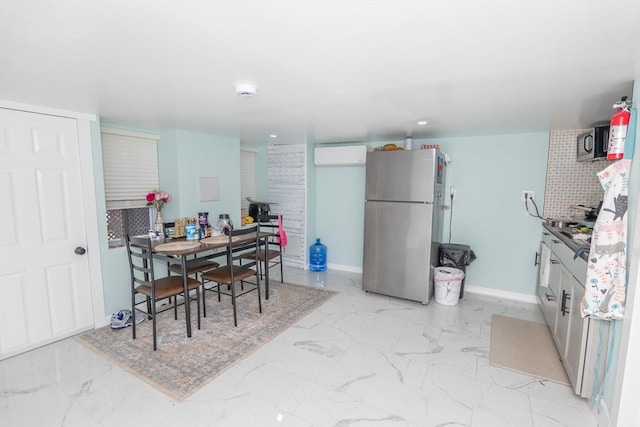 33 Williams St, New London, CT 06320 - dining area with a wall mounted AC, light marble finish floors, and recessed lighting