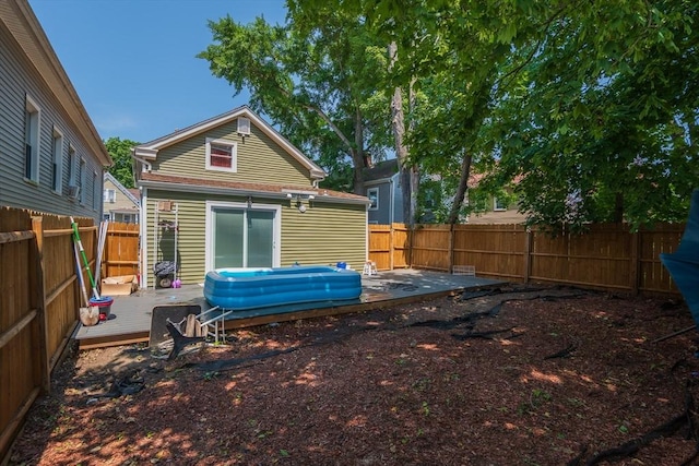 33 Williams St, New London, CT 06320 - rear view of property featuring a deck and a fenced backyard