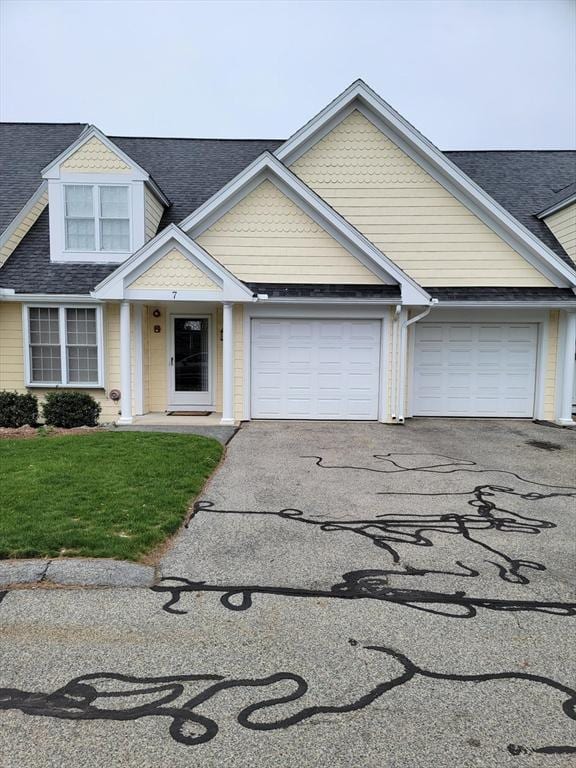 281 Rowley Bridge Rd Unit 7, Topsfield, MA 01983 - view of front of property with asphalt driveway, an attached garage, roof with shingles, and a front yard