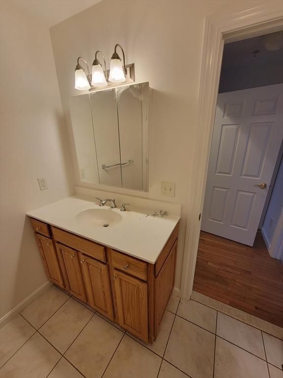 281 Rowley Bridge Rd Unit 7, Topsfield, MA 01983 - bathroom featuring vanity, tile patterned floors, and baseboards