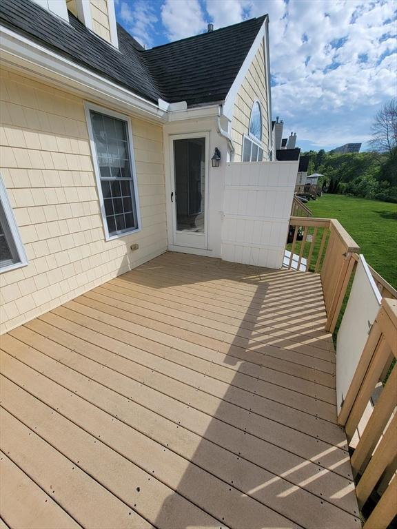 281 Rowley Bridge Rd Unit 7, Topsfield, MA 01983 - wooden deck with a lawn