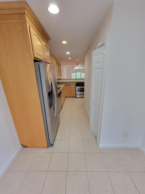 281 Rowley Bridge Rd Unit 7, Topsfield, MA 01983 - kitchen featuring stainless steel fridge, light tile patterned floors, stove, baseboards, and recessed lighting