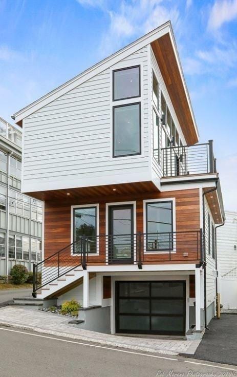 contemporary home with a balcony