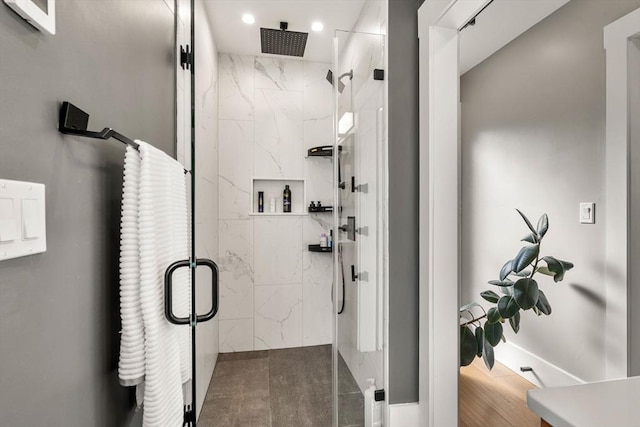 bathroom with a shower stall