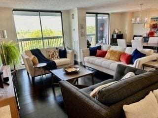 40 Village Rd Unit 606, Middleton, MA 01949 - living area with a chandelier