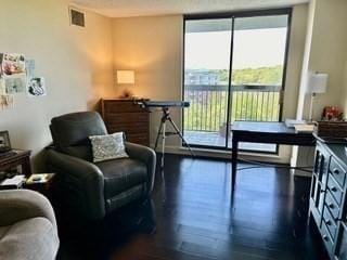 40 Village Rd Unit 606, Middleton, MA 01949 - living area with wood finished floors and a wall of windows