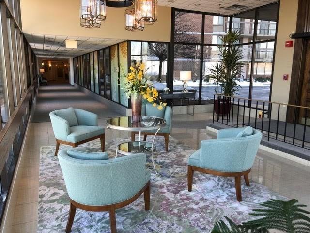 40 Village Rd Unit 606, Middleton, MA 01949 - lobby featuring a towering ceiling and expansive windows