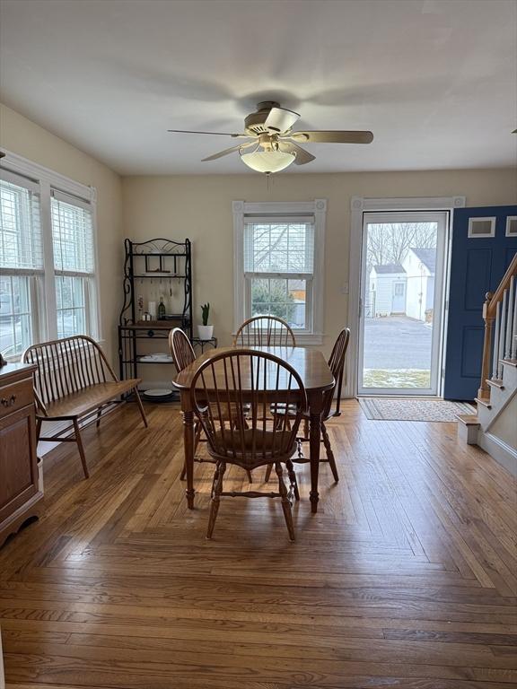 dining room featuring parquet floors and a healthy amount of sunlight