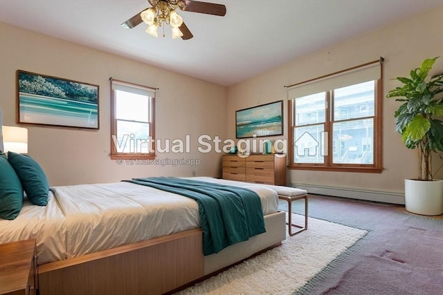 135 Main St, Blackstone, MA 01504 - bedroom featuring a baseboard radiator and a ceiling fan