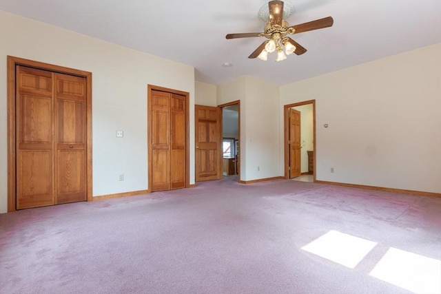 135 Main St, Blackstone, MA 01504 - unfurnished bedroom featuring two closets, light carpet, and ceiling fan