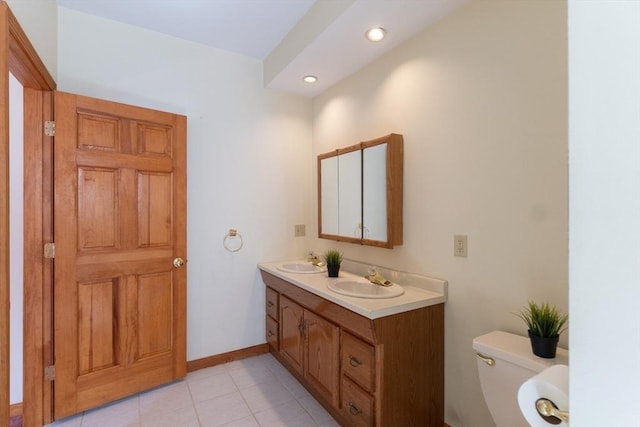 135 Main St, Blackstone, MA 01504 - full bath with double vanity, tile patterned flooring, and recessed lighting