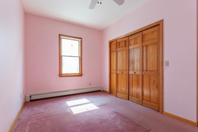 135 Main St, Blackstone, MA 01504 - unfurnished bedroom with a baseboard heating unit, carpet flooring, a ceiling fan, and a closet
