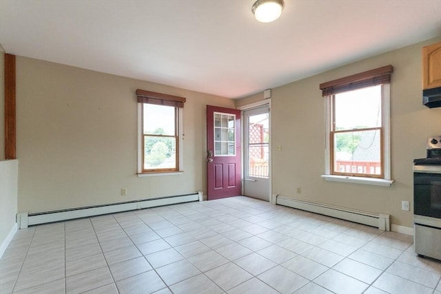 135 Main St, Blackstone, MA 01504 - kitchen featuring a baseboard heating unit, stainless steel electric range, and light tile patterned floors
