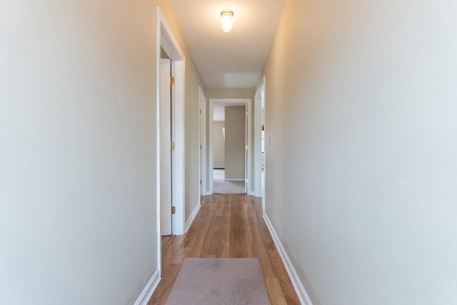 135 Main St, Blackstone, MA 01504 - corridor featuring light wood-style flooring and baseboards