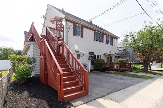 135 Main St, Blackstone, MA 01504 - view of front of house featuring stairs and a deck