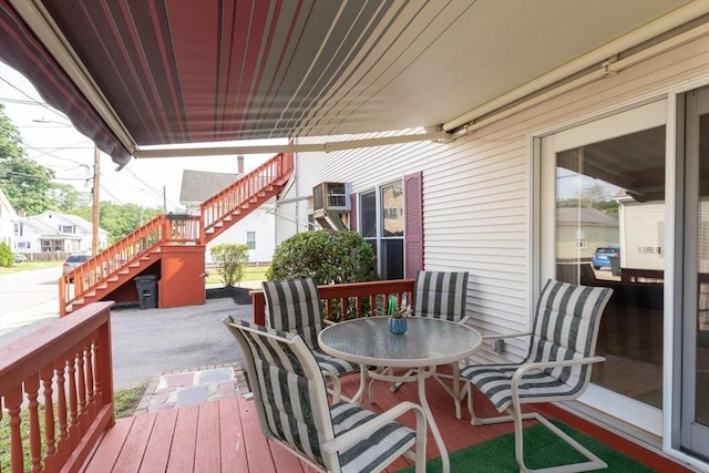 135 Main St, Blackstone, MA 01504 - wooden deck with stairs, outdoor dining area, and a wall mounted AC