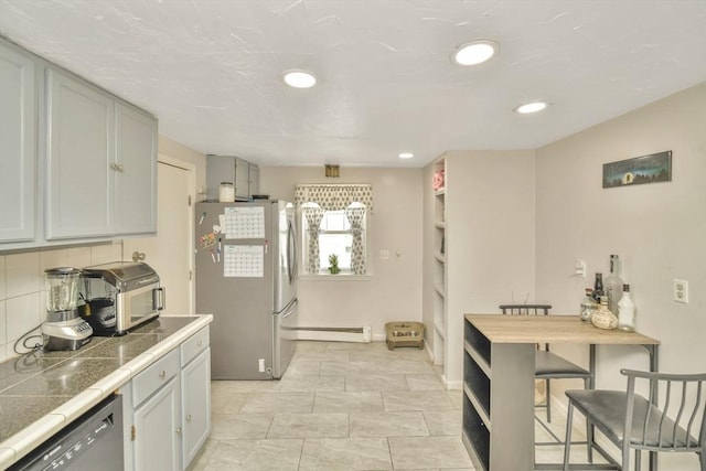 120 E Ashland St, Brockton, MA 02302 - kitchen featuring appliances with stainless steel finishes, a baseboard radiator, recessed lighting, backsplash, and baseboards