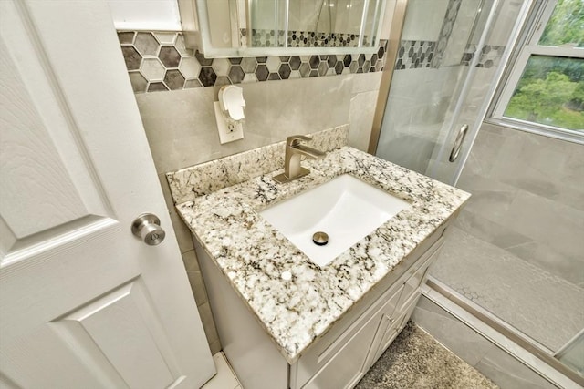 120 E Ashland St, Brockton, MA 02302 - full bath with tile walls, a shower stall, and vanity