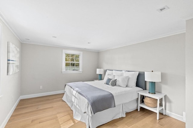 1164 Main St, Hingham, MA 02043 - bedroom with light wood finished floors, ornamental molding, and baseboards