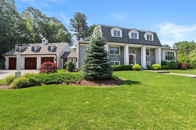 1164 Main St, Hingham, MA 02043 - view of front of property featuring a garage, a front yard, driveway, and stone siding