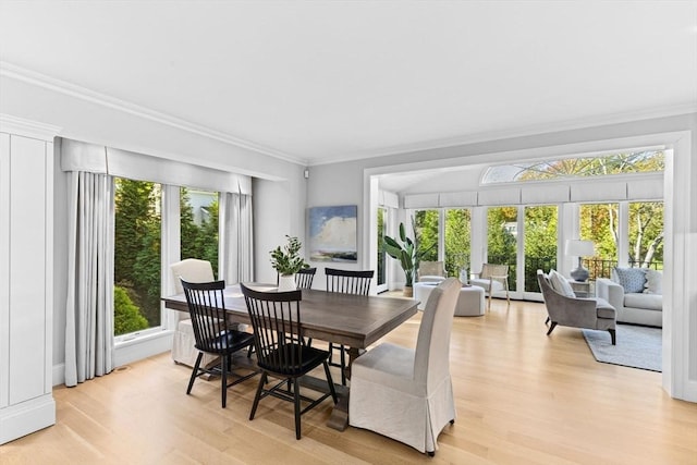 1164 Main St, Hingham, MA 02043 - dining space with light wood finished floors and ornamental molding