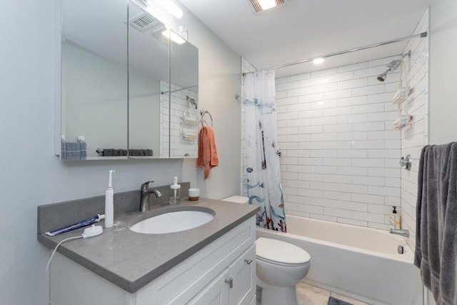 bathroom with shower / bathtub combination with curtain, vanity, toilet, and tile patterned floors