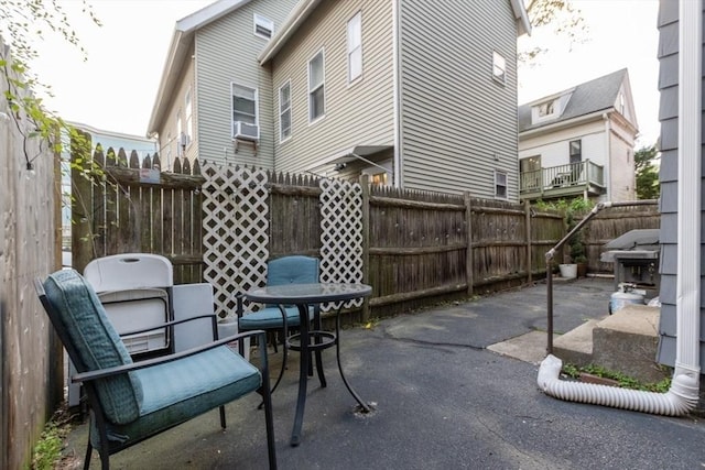 view of patio / terrace featuring a fenced backyard and cooling unit