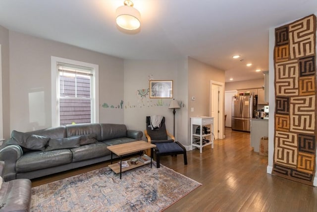 living room featuring dark wood-style floors and recessed lighting