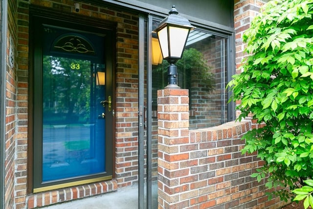33 Cobblestone Ln Unit 33, Worcester, MA 01606 - doorway to property with brick siding